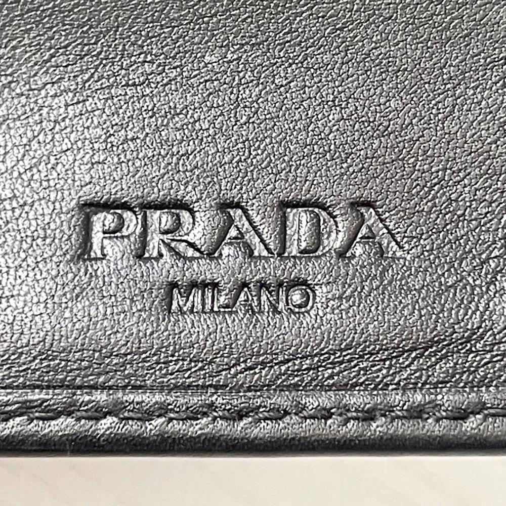 Prada black soft calfskin leather vertical breast pocket wallet